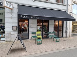Front + outdoor seating at PLUS in Ghent