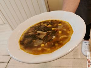 Minestrone with kohlrabi corn and beluga lentils at Herbivore in Prague
