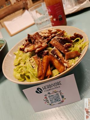 spinach tagliatelle with smoked tofu, sundried tomatoes and cashew parmesan at Herbivore in Prague