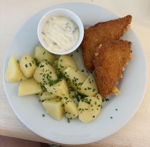 coated fried vegan cheese with cooked potatoes, vegan tartar sauce!  at Herbivore in Prague