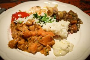 sweet potato curry, rice, hummus at Herbivore in Prague