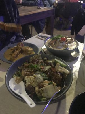 Tofu satay skewers, red curry with tofu and cashews and pad see ew with chicken at Hot Chilli Bean Thai Cafe in Coolum Beach