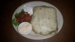 Their burritos are huge!! This is the fajita burrito and it was super delicious. Get it with vegan cheese and vegan dipping sauces!   at Mad Mex in Columbus
