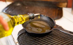 Shakshuka preparation at Pitarija Fire Place in Vilnius