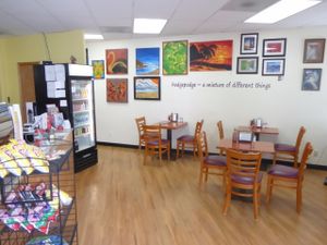 Local artists adorn the walls. at Hodge Podge Cafe in Kenmore
