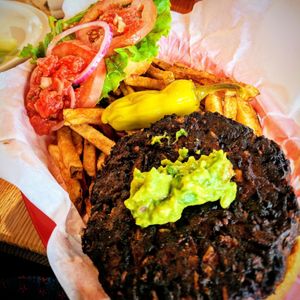 Black bean burger with guacamole and salsa.  at Longs Peak Pub in Longmont