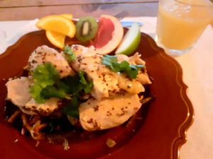 Honey chicken and oven roasted aubergine. Work a ginger and melon juice at Agua no Bico in Lisbon