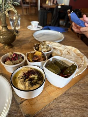 Mezze - pickles, hummus, baba, potatoes, cauliflowerr  at Cheder in Krakow
