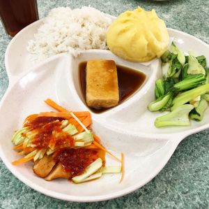 vegan chick'n, tofu, book choy, & steamed bun set. comes with cold herbal tea.  at Water Lily Restaurant in Kuala Lumpur