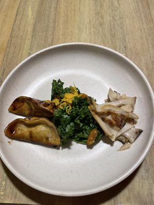 Wontons, kale, and mushrooms   at Ali Pacha in La Paz