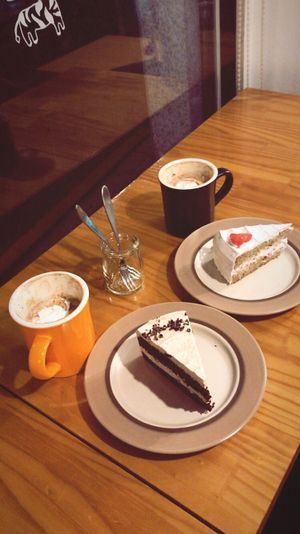 Amazing delicious vegan+gluten-free peanut butter chocolate and grapefruit creamy cakes with how cocoa and whipped cream  at DalYang - Sweet Kitten 달냥 in Seoul