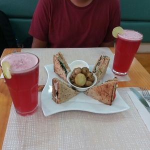 Club sandwich and berrie's lemonade at The Plant Based Factory in Miraflores