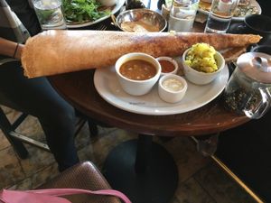 paper Dosa & black tea  at Dosa - Mission District in San Francisco