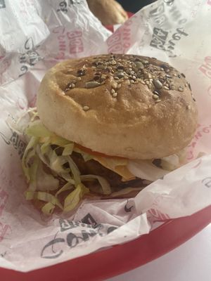 Beyond burger with sauce  at Comet 984 in Playa Del Carmen