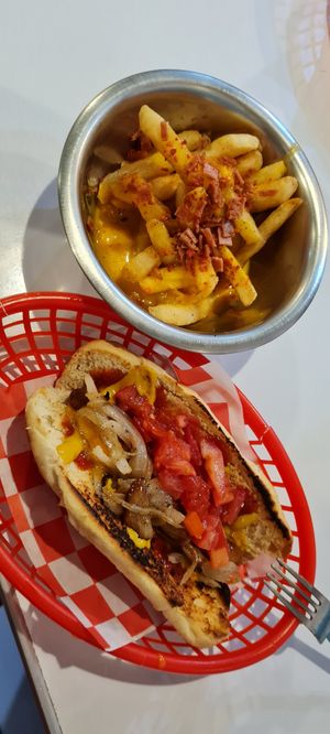 Cheesy hot dog and patas with cheese at Comet 984 in Playa Del Carmen