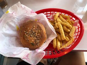 Cheeseburger (with Beyond meat) and french fries at Comet 984 in Playa Del Carmen