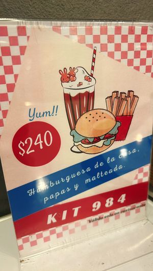 menu with burger + fries + milkshake  at Comet 984 in Playa Del Carmen