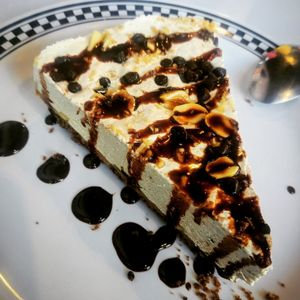 Vegan Snickers cheesecake.   at Comet 984 in Playa Del Carmen