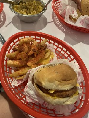 Cheese burger with Beyond patty and cheese fries at Comet 984 in Playa Del Carmen
