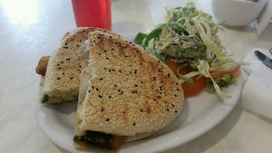 Roasted vegetables and vegan cheese panini with vegan coleslaw  at Cafe 50 in Yeovil