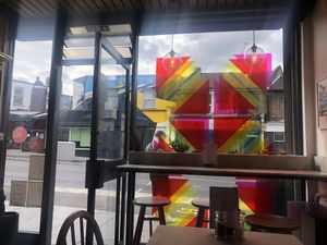 Groovy front windows & entrance   at Buhler & Co in East London