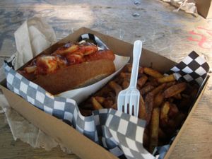 K-Pop hot dog with kimchi, bbq sauce and black sesame seeds at Dirty Pizza in Montreal