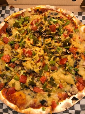 The vegan "vege pizza" sub olives for jalapeños  at Dirty Pizza in Montreal