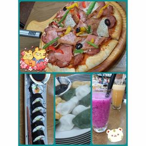Pizza, sushi, dumplings, and juices. at Bugua in Guangzhou