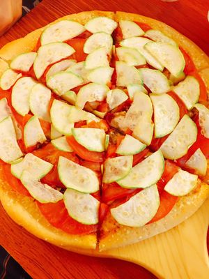 Fresh vegetables pizza with tomato sauce at Bugua in Guangzhou