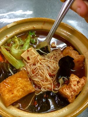 Red yeast mee sua $6. With beancurd, beancurd skin, mushrooms, black fungus, corn, lettuce. Small red thingies look like goji berries. Tasted like tomato puree. at Vege Pot 素砂煲 in Central Singapore