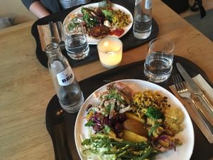 our plates filled with vegan goodness at Noordoever in Leuven