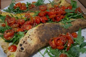 Folded pizza - very filling with fresh ingredients! at Vitto Pitagorico in Naples