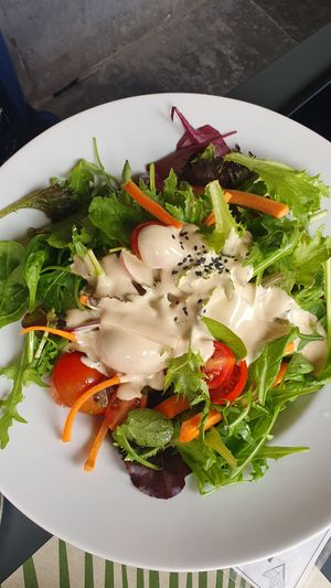 SESAME, Mixed salad, cherry tomatoes, carrots and sesame dressing at Vitto Pitagorico in Naples