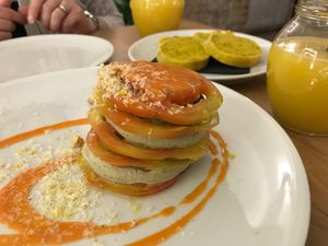 Calabrese appetizer with hemp ricotta cheese, pesto and tomato. Mmmmm!! at Vitto Pitagorico in Naples