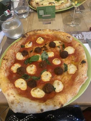 Happy pig pizza  at Vitto Pitagorico in Naples