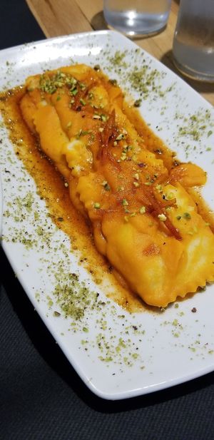 Ravioli! The sauce was squash blended with orange and had candied chili orange rind on top. Superb! at Vitto Pitagorico in Naples