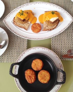 Eggs Benedict with side of potatoes  at Wynn Hotel - Tableau in Las Vegas