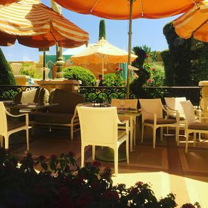 outdoor seating adjacent to the pool at Wynn Hotel - Tableau in Las Vegas