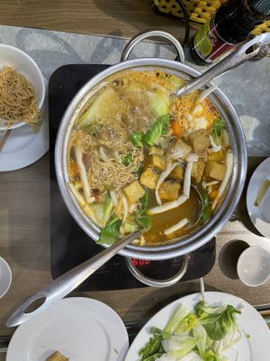Hot pot with vegetables, mushrooms, noodles, tofu and different vegan “meats”   at Buddha Belly in Cat Ba