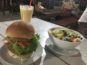 Triple veg burger, mango lassi and a veg soup! Very nice  at Buddha Belly in Cat Ba