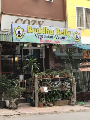 Cute store front with some outdoor seating  at Buddha Belly in Cat Ba