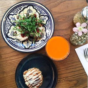 The savory vegan cheese, sun-dried tomatoes, pumpkin seeds and roquette toast is on of my favorite. Take the cinnamon roll after that. The juice called "dynamite" is really good. at Ou Bien Encore in Geneva