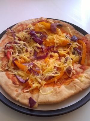 Mushroom, onion, pepper and vegan cheese pizza at Roots Cafe in South Shields