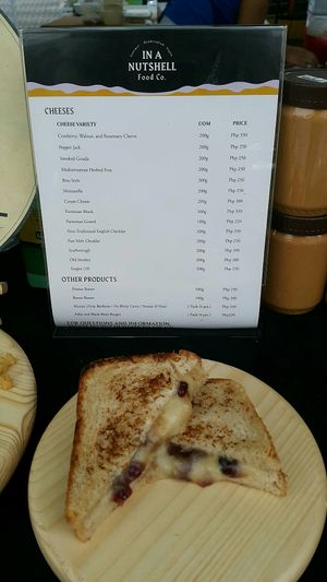 Cheeese on delivery and delicious looking sandwich (I didn't taste it) at Legazpi Sunday Market in Makati