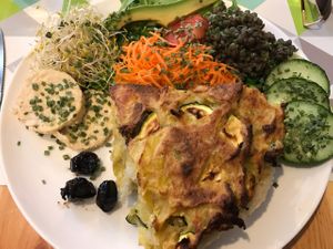 potato zucchini pie with side salad, veg and tempeh at Le Speakeasy in Nice