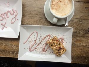 apple crumble cake and topi is latte at Pumpkin Brown in Edinburgh