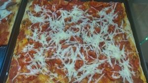 Vegan pizza with peppers, cherry tomatoes & mozzarella at Pizzeria Vicenti in Krakow