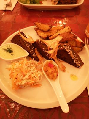 Seitan steak with wedges, chutney, coleslaw and mayo at Estudio Vegetariano in Lagos