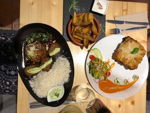 Vegan lasagna, chips with garlic Mayo, seitan and caponata  at Estudio Vegetariano in Lagos