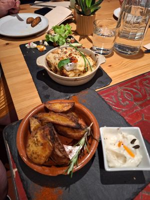 Lasagne and rosemary potatoes at Estudio Vegetariano in Lagos